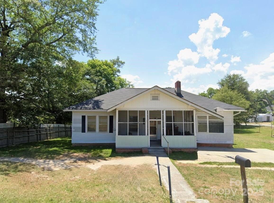 a view of a house with a swimming pool