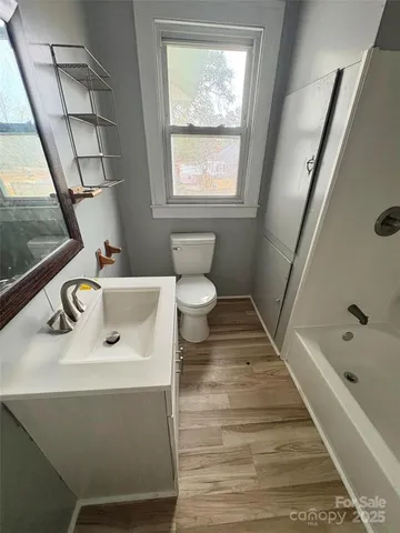 a bathroom with a sink and a bathtub