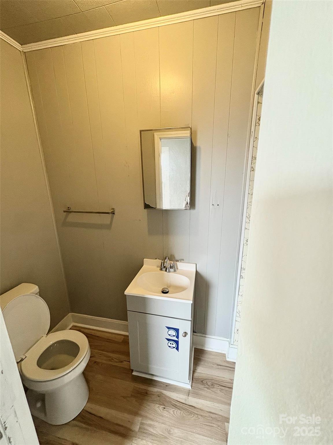 8 Maple Street Great Falls, SC 29055 - Photo 9 of 15 a bathroom with a sink toilet and vanity