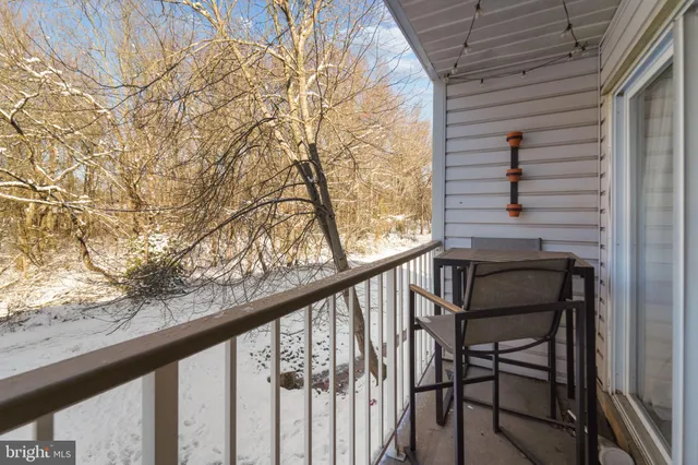 a view of balcony with furniture