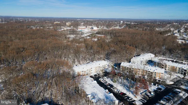 an aerial view of residential building and street