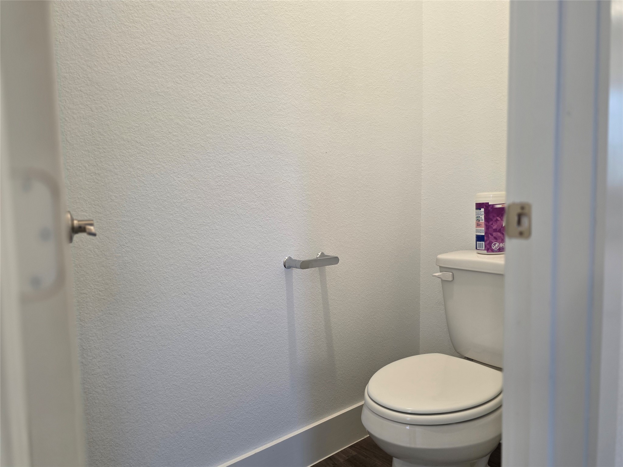 13725 Rising Sun Lane Conroe, TX 77384 - Photo 14 of 29 a white toilet sitting in a bathroom next to a sink