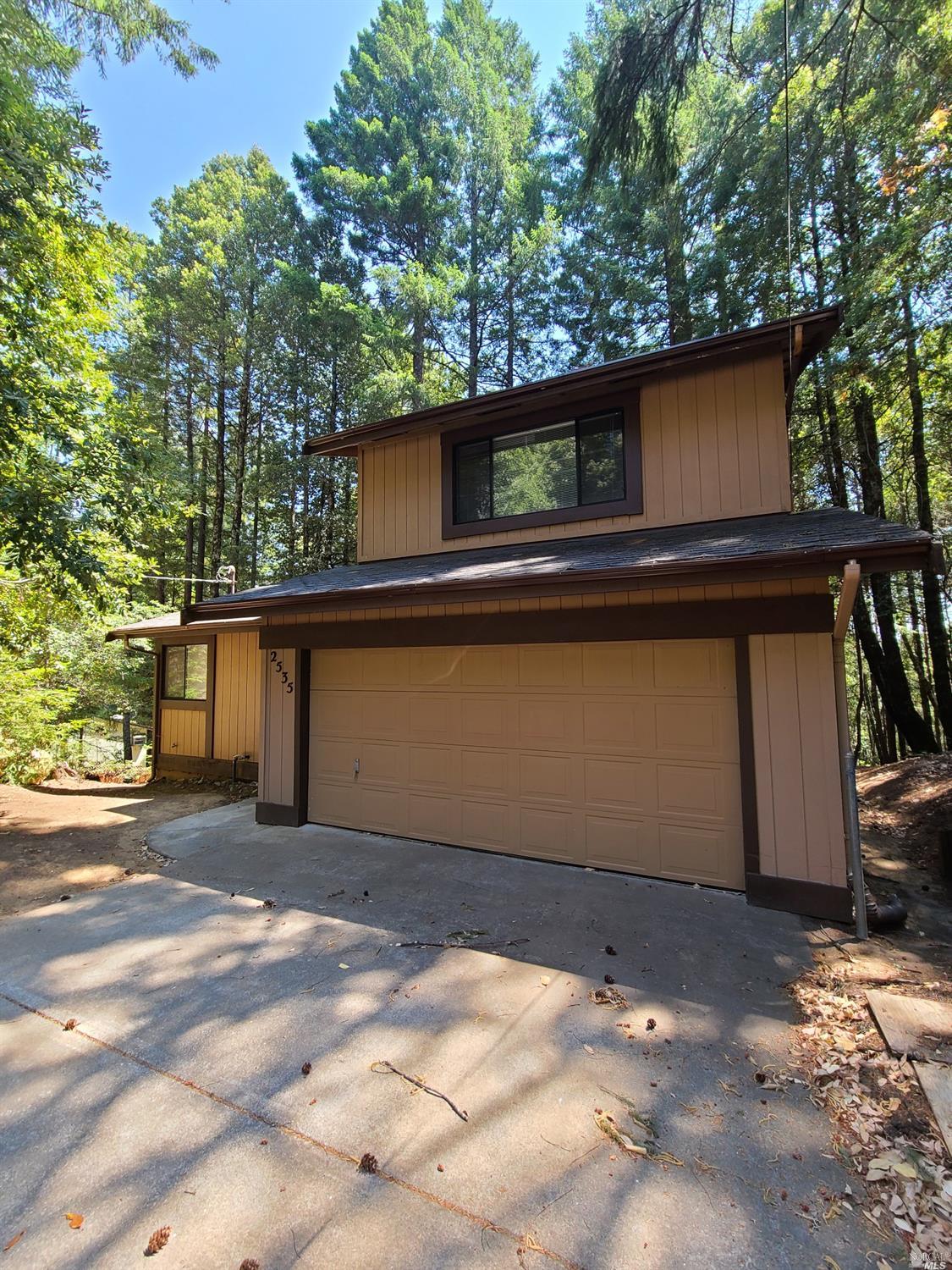 2535 Goose Road Willits, CA 95490 - Photo 1 of 1 a backyard of a house with lots of green space