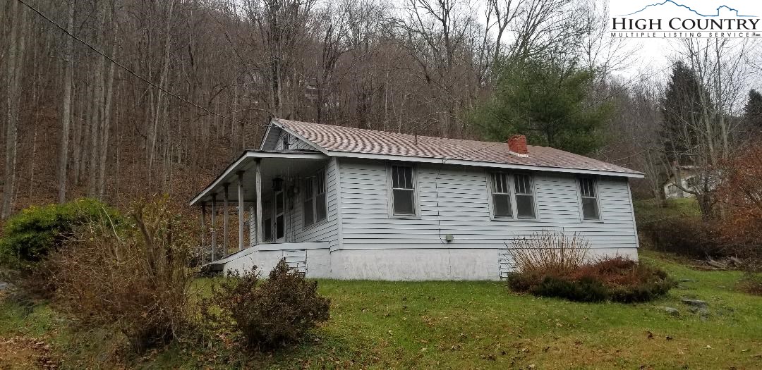 456 Grady Winkler Road Boone, NC 28607 - Photo 15 of 18 a view of a house with a yard