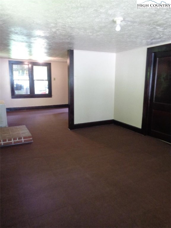 456 Grady Winkler Road Boone, NC 28607 - Photo 7 of 18 an empty room with windows