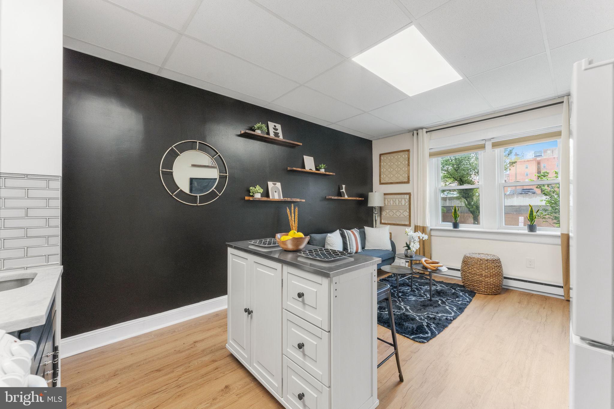 2002 17th Street Northwest, Unit 2 Washington, DC 20009 - Photo 7 of 38 Bright and airy kitchen and living room