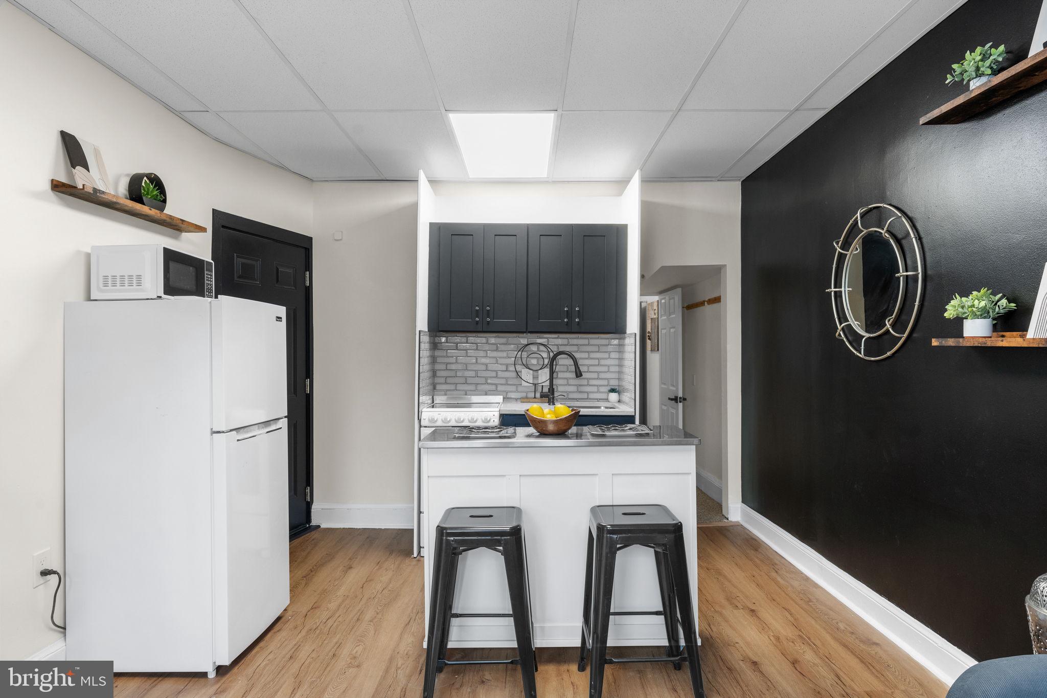 2002 17th Street Northwest, Unit 2 Washington, DC 20009 - Photo 9 of 38 Beautiful granite counter tops and designer bac