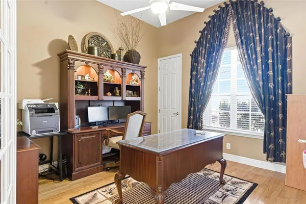 a kitchen with granite countertop a sink counter top space appliances and cabinets