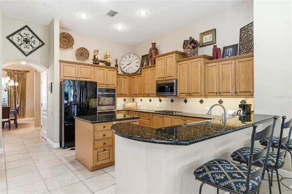 a large spacious bathroom with a large tub shower and sink