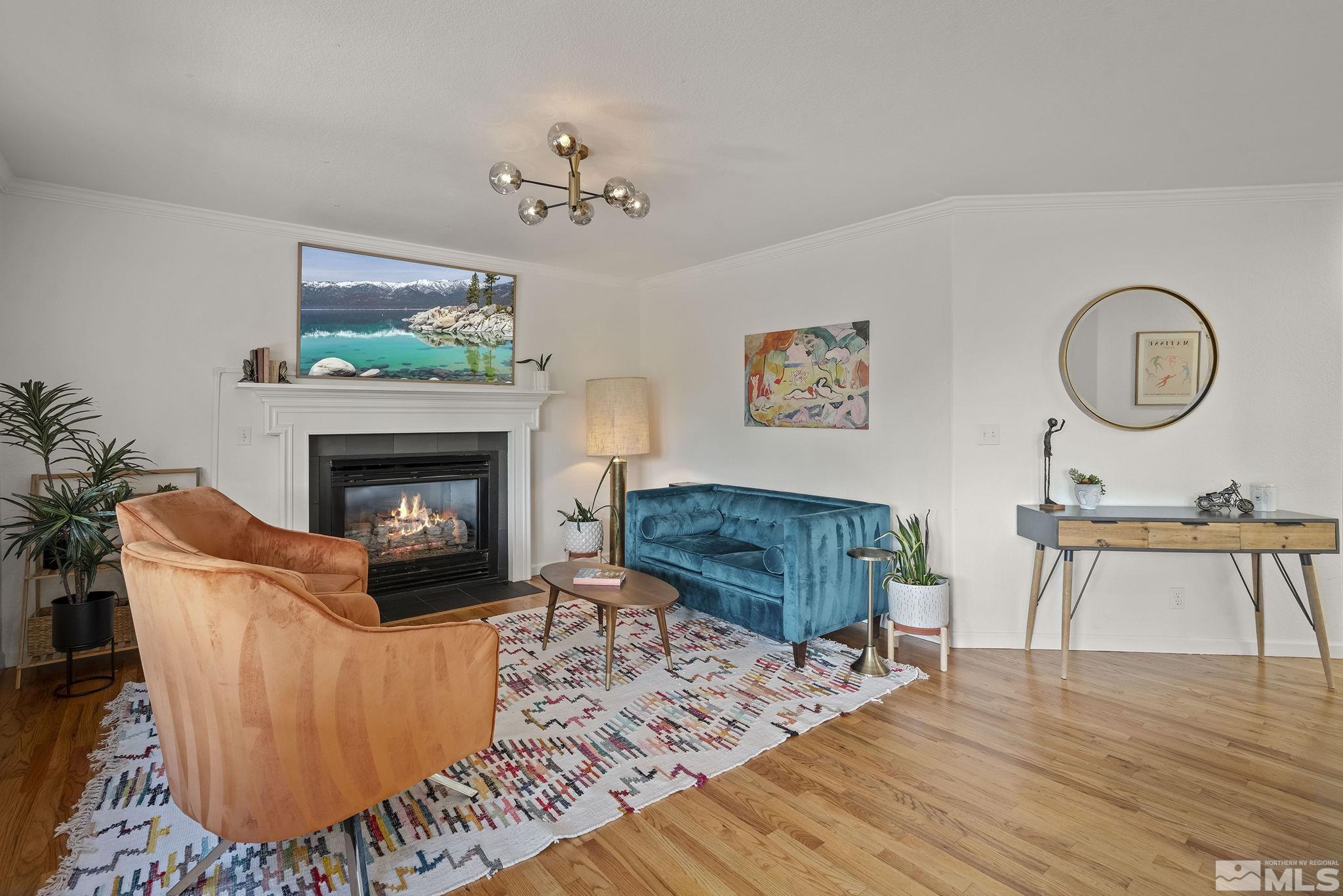 3341 Corey Drive Reno, NV 89509 - Photo 15 of 40 a living room with furniture and a fireplace