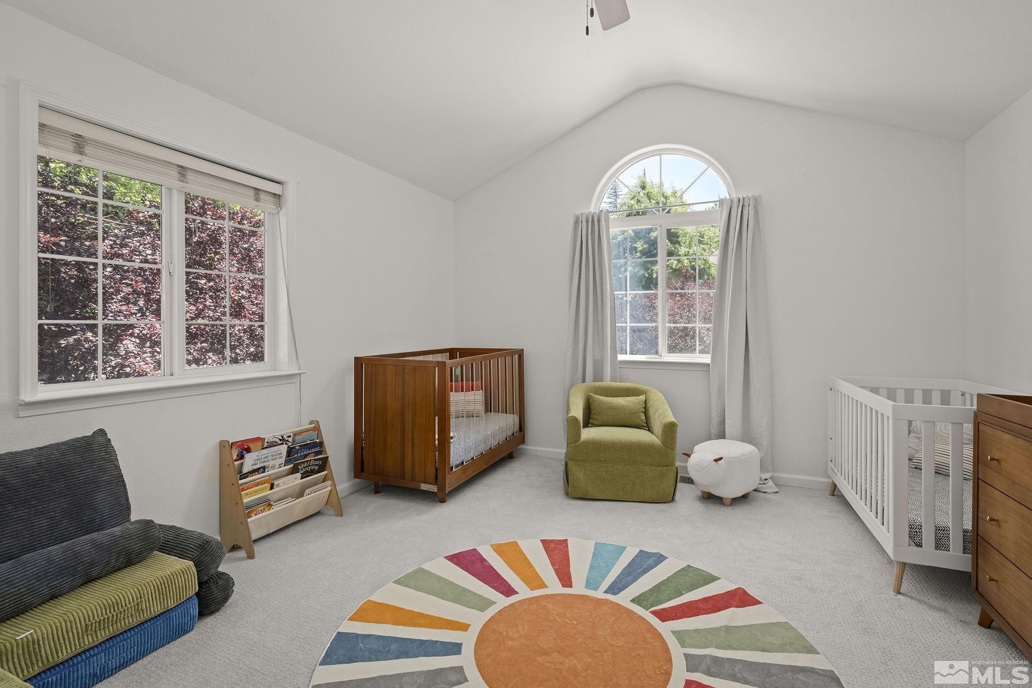 3341 Corey Drive Reno, NV 89509 - Photo 24 of 40 a bedroom with furniture and a large window