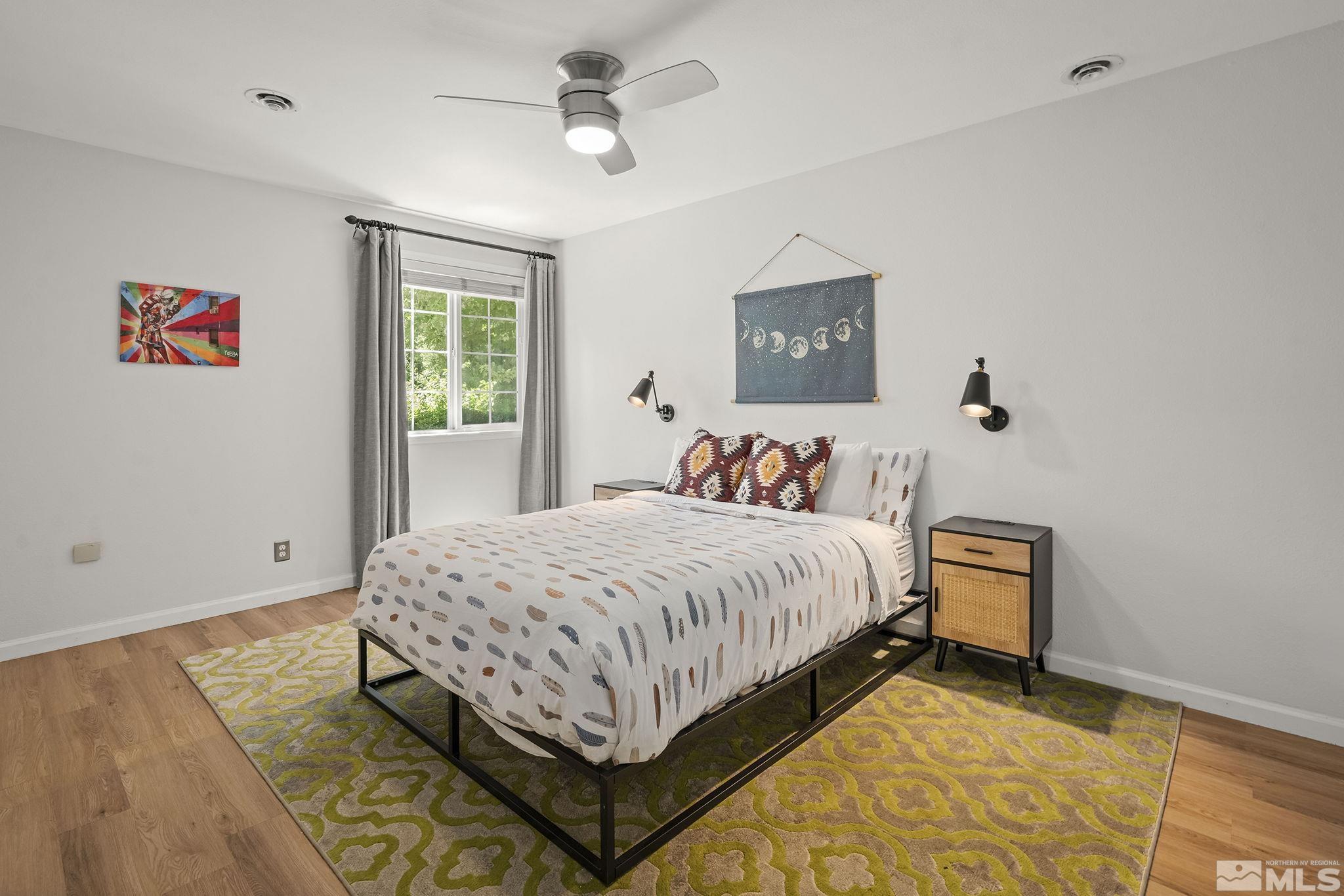 3341 Corey Drive Reno, NV 89509 - Photo 28 of 40 a bedroom with a bed and window