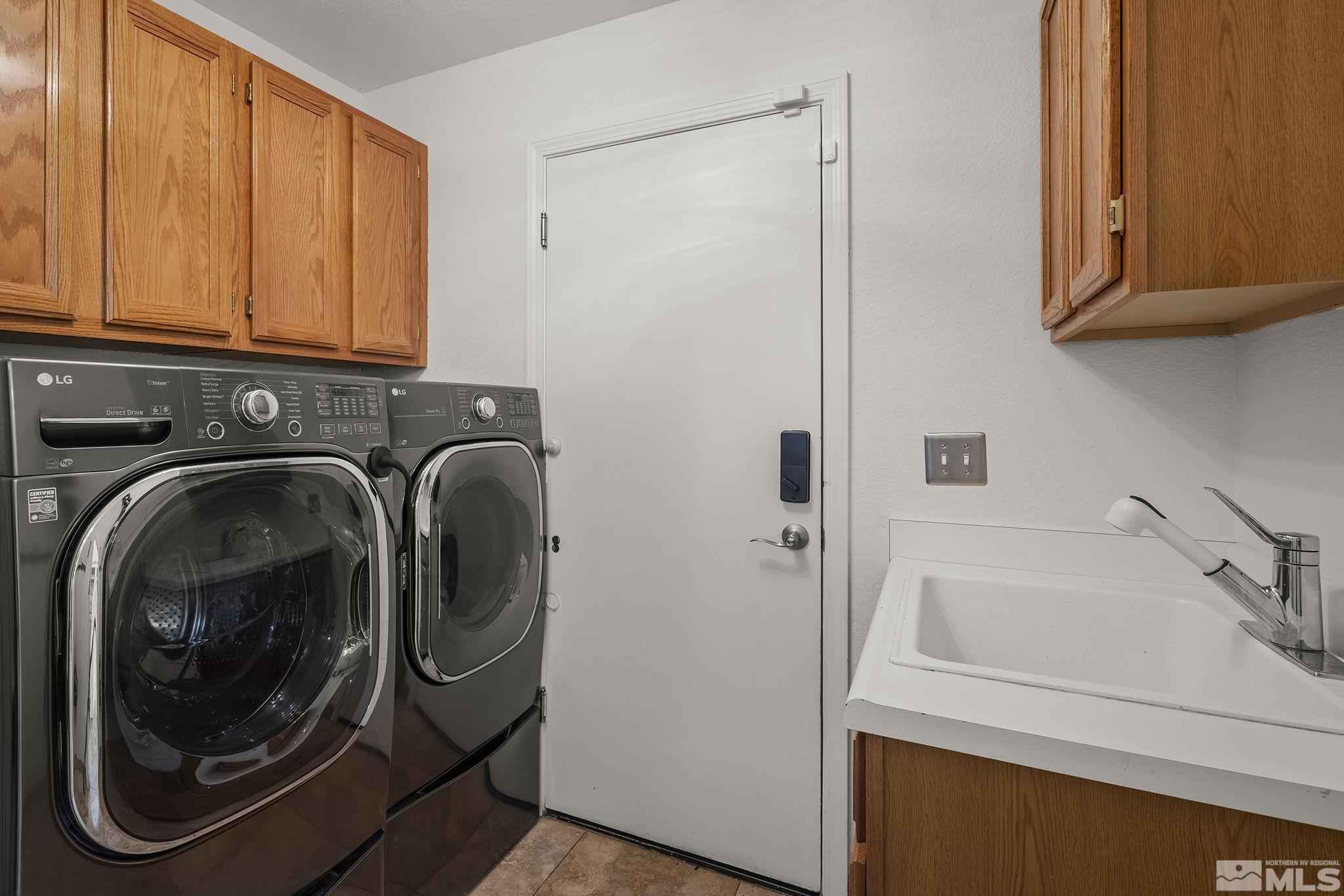 3341 Corey Drive Reno, NV 89509 - Photo 31 of 40 a utility room with dryer and washer
