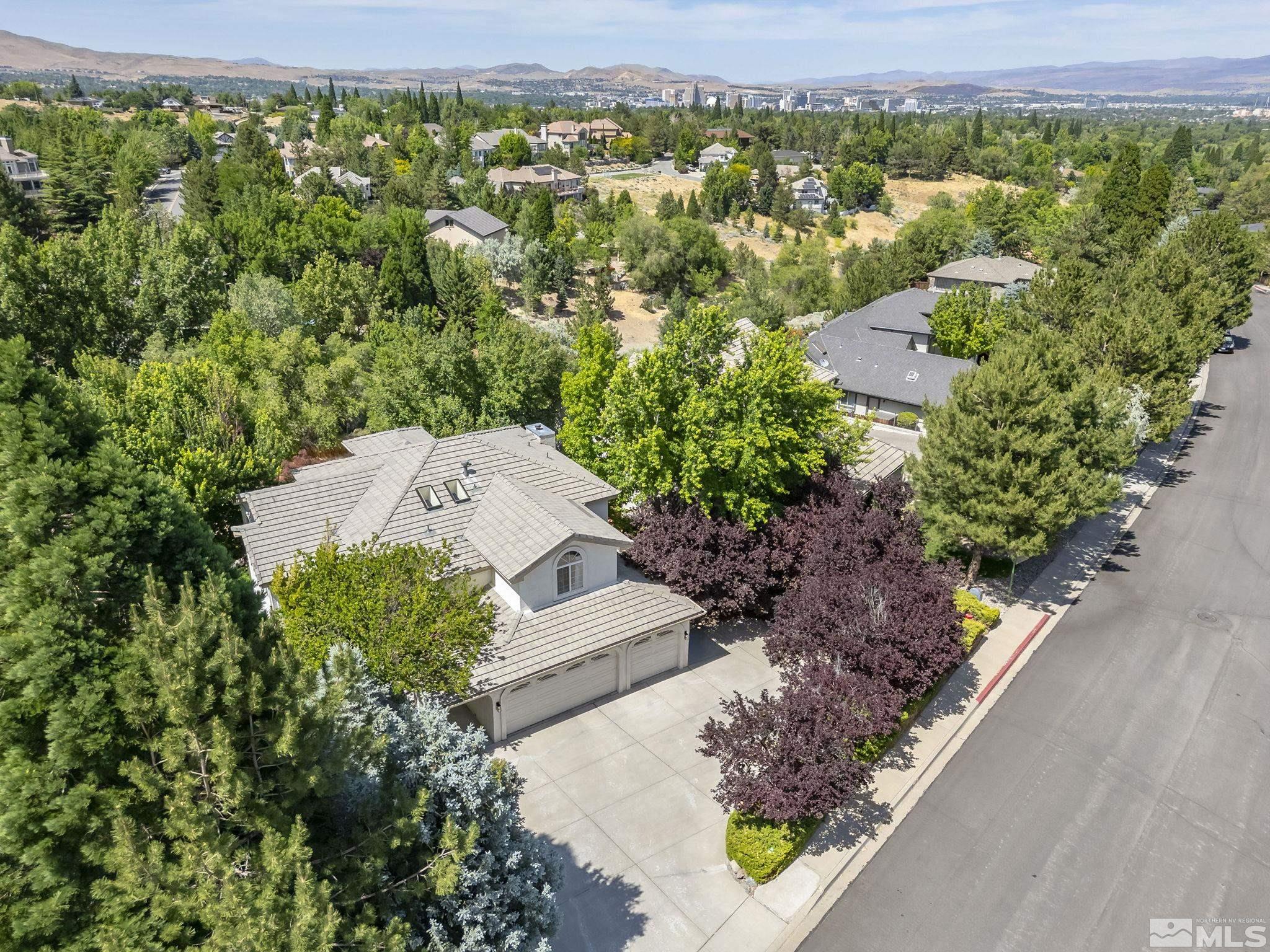 3341 Corey Drive Reno, NV 89509 - Photo 39 of 40 an aerial view of a house with a yard