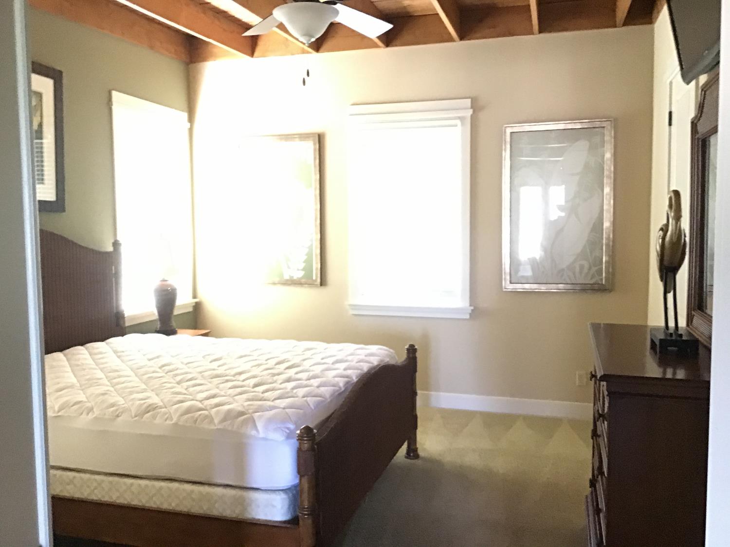 360 Town Square Road Copperopolis, CA 95228 - Photo 12 of 22 a bedroom with a bed and a window