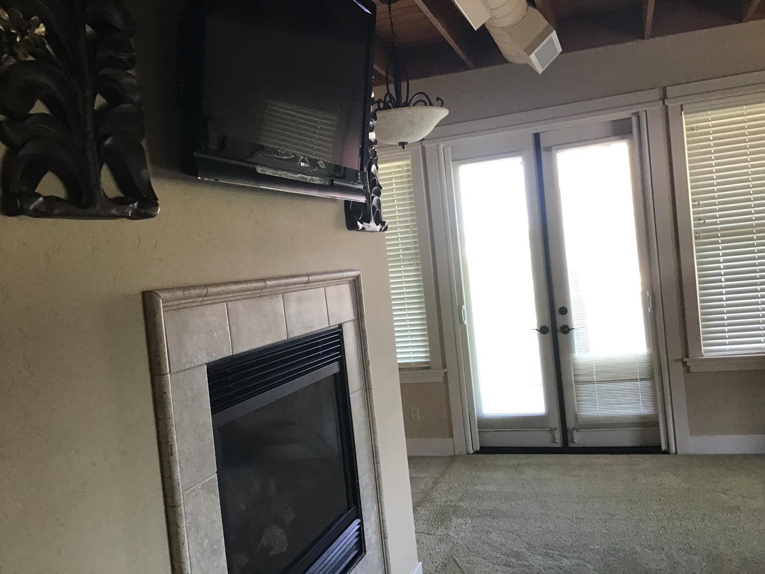 360 Town Square Road Copperopolis, CA 95228 - Photo 7 of 22 a view of a livingroom with a fireplace
