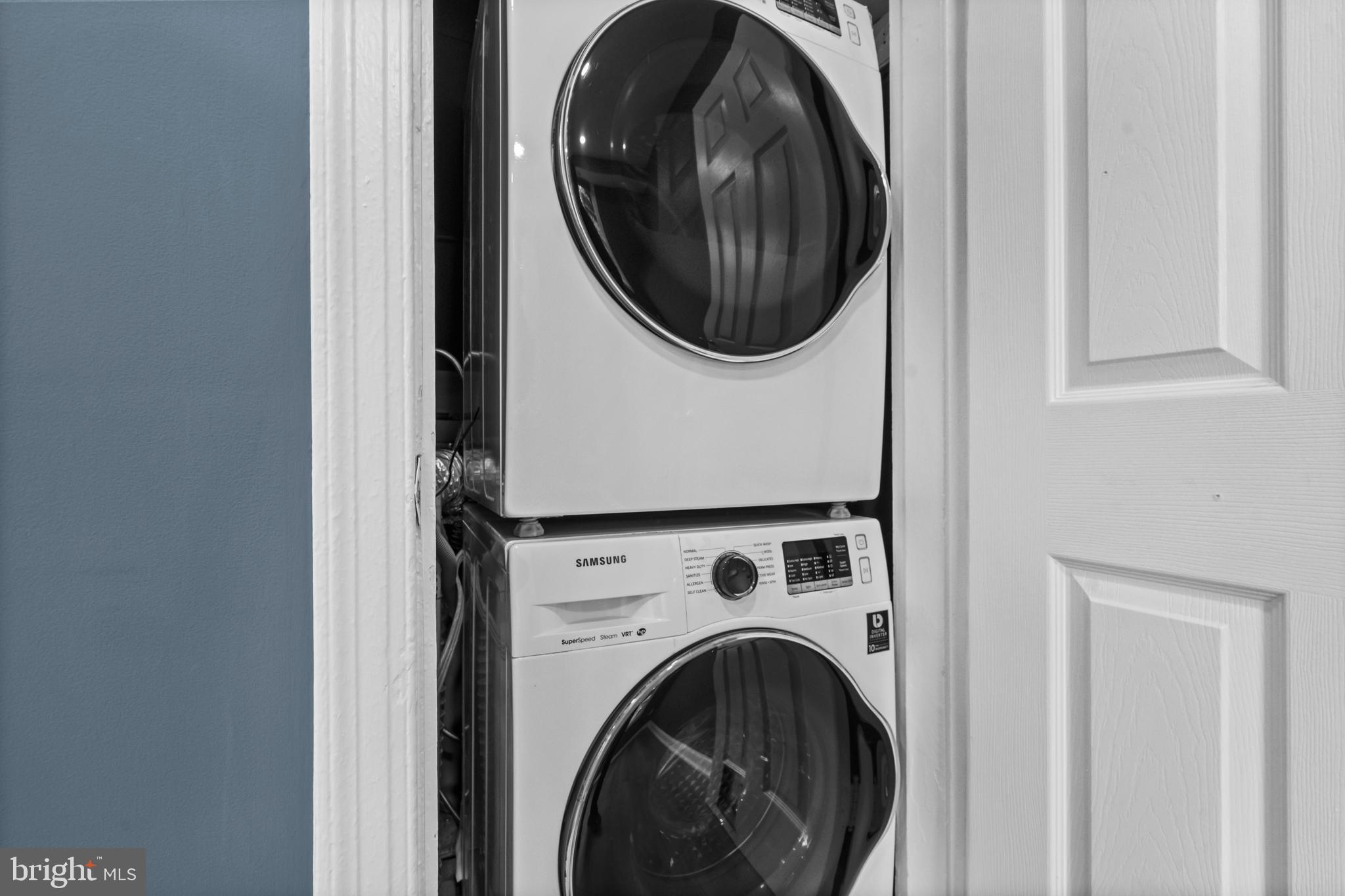 1400 South Edgewood Street, Unit 527 Arlington, VA 22204 - Photo 13 of 32 a close up view of a washer and dryer