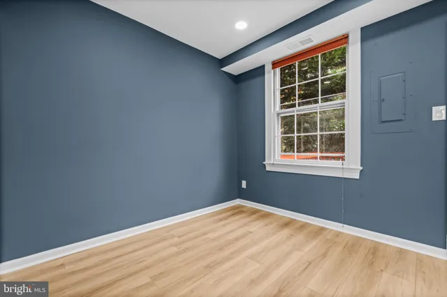 a view of empty room with windows