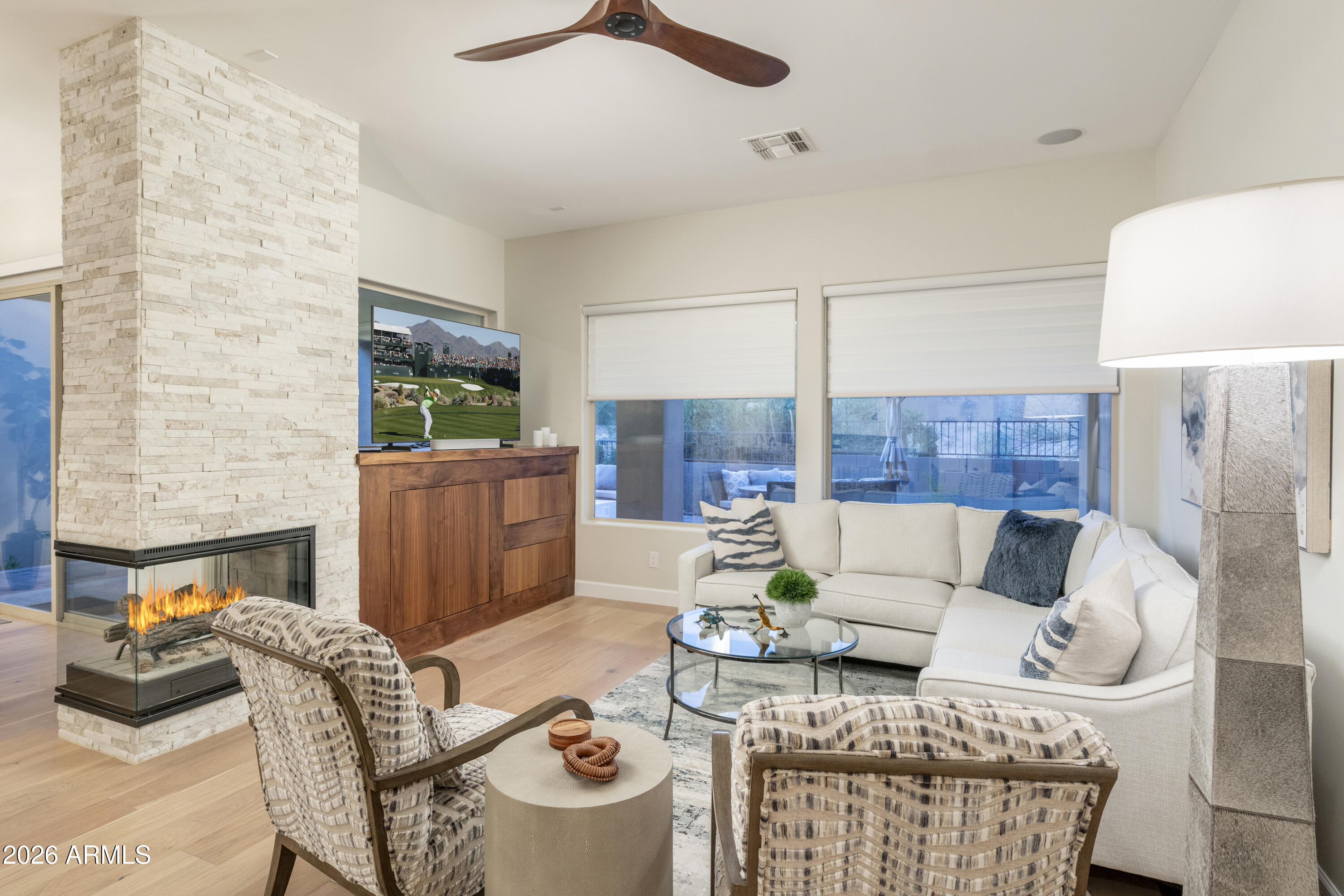 7278 East Eagle Feather Road Scottsdale, AZ 85266 - Photo 7 of 45 Great Room with 3 Sided Fireplace