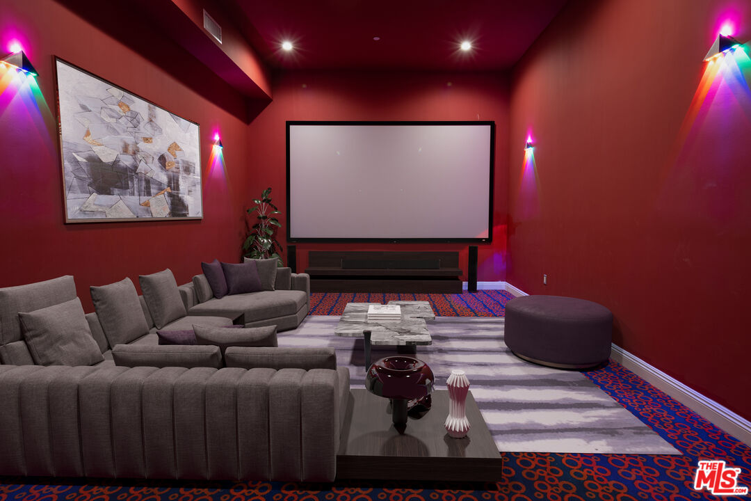 156 North Wetherly Drive Beverly Hills, CA 90211 - Photo 23 of 57 a projector room with furniture
