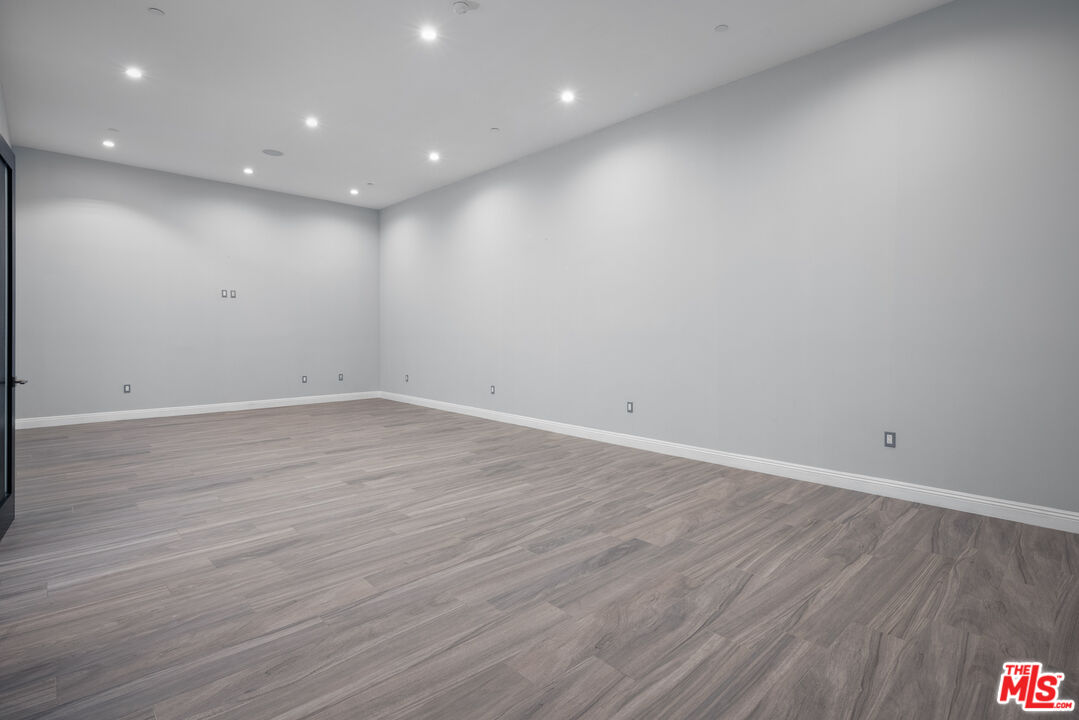 156 North Wetherly Drive Beverly Hills, CA 90211 - Photo 27 of 57 a view of room with wooden floor