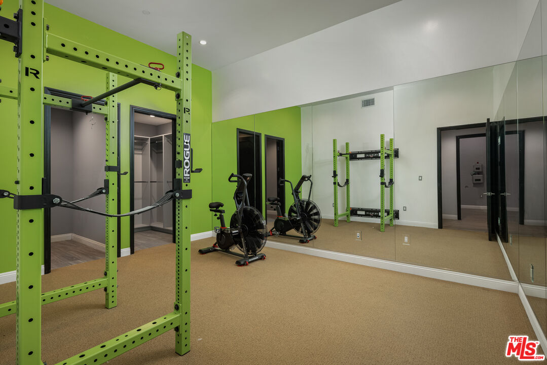 156 North Wetherly Drive Beverly Hills, CA 90211 - Photo 28 of 57 a view of a room with gym equipment