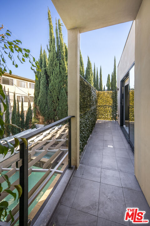 156 North Wetherly Drive Beverly Hills, CA 90211 - Photo 40 of 57 a view of a pathway of a house