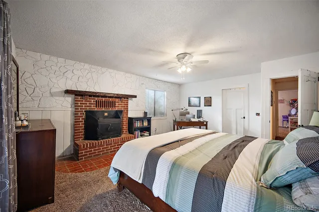 a bed room with a bed and a television