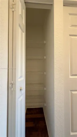 a bathroom with a glass door