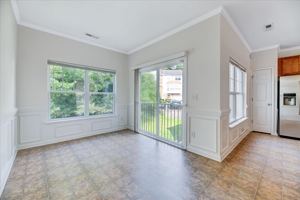11838 Canemount Street Raleigh, NC 27614 - Photo 14 of 34 a view of an empty room with a window