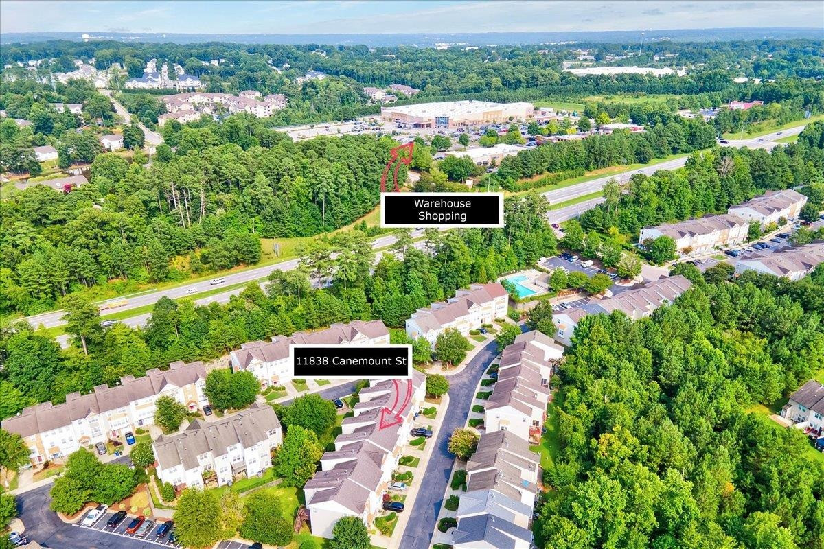 11838 Canemount Street Raleigh, NC 27614 - Photo 31 of 34 an aerial view of residential houses with outdoor space and street view