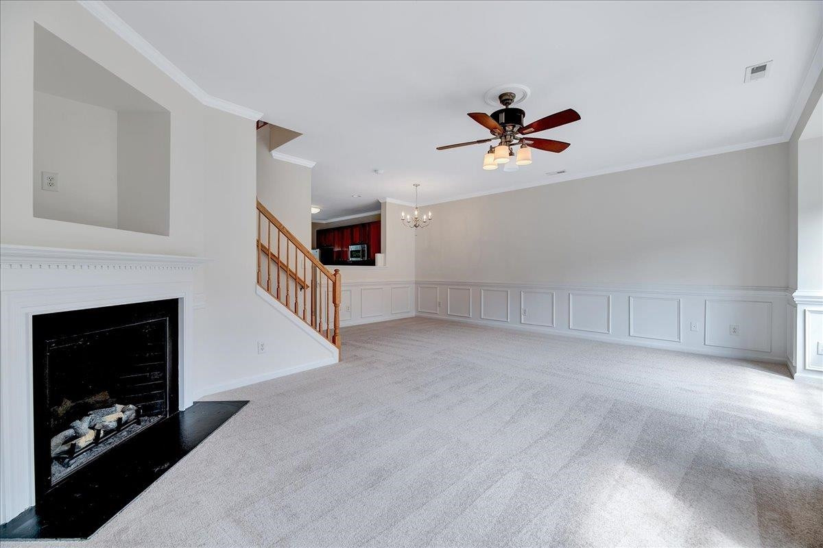 11838 Canemount Street Raleigh, NC 27614 - Photo 5 of 34 a view of a livingroom with furniture and a fireplace