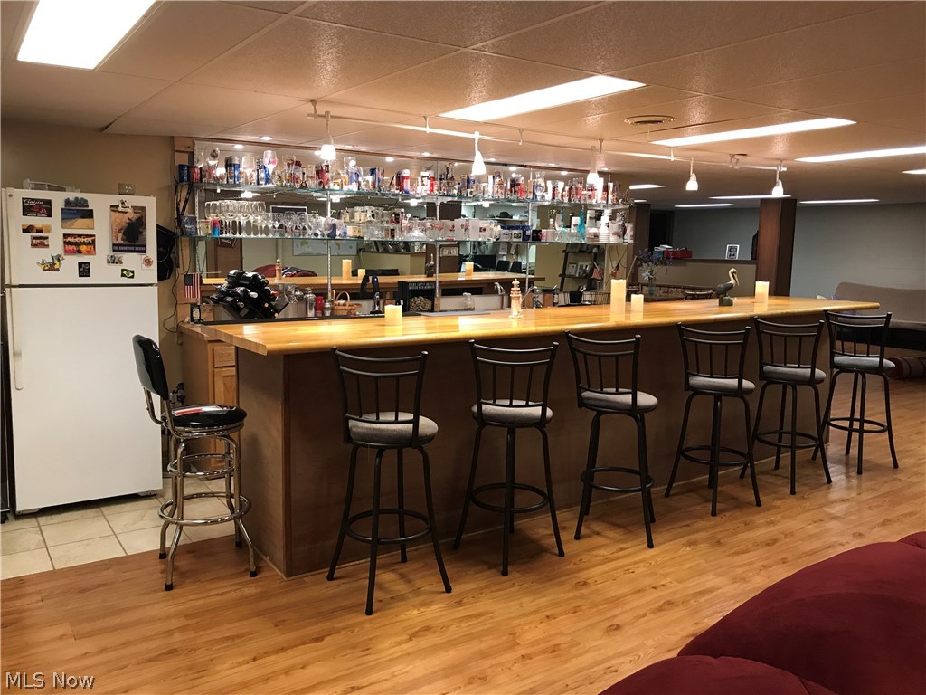 15618 Trinter Road Vermilion, OH 44089 - Photo 24 of 29 Lower Level - built in bar with appliances (bar stools included).