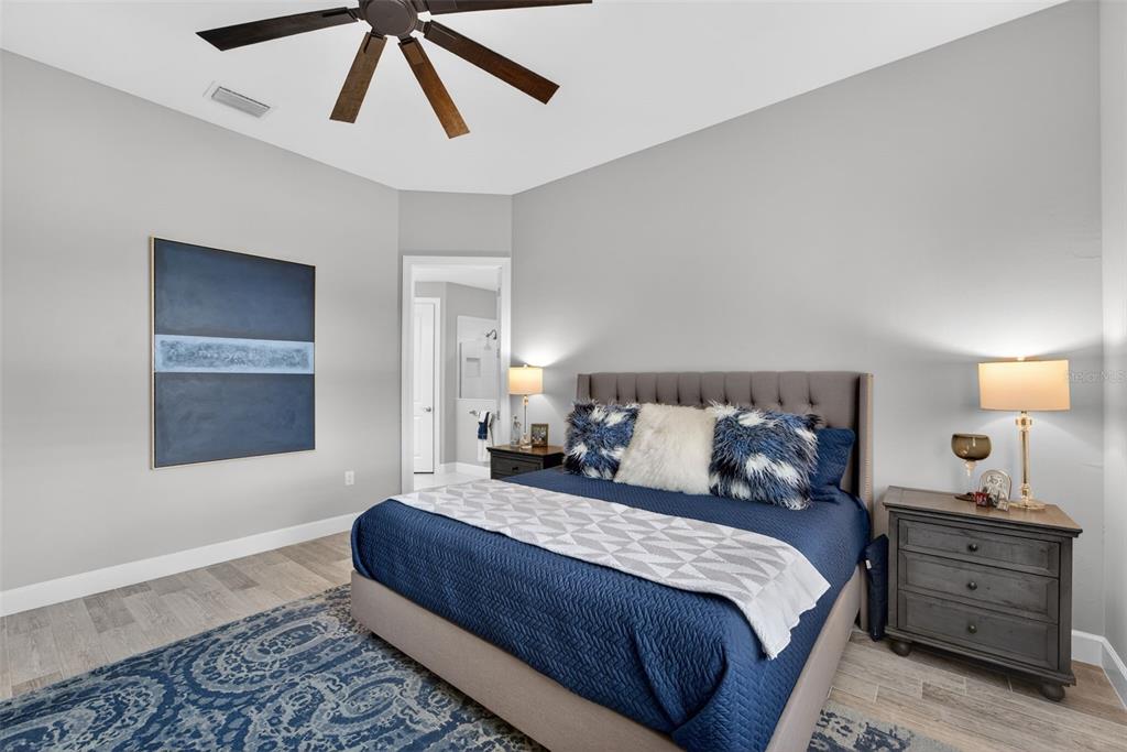 1721 Hyssop Loop North Port, FL 34289 - Photo 28 of 70 a bedroom with bed and window