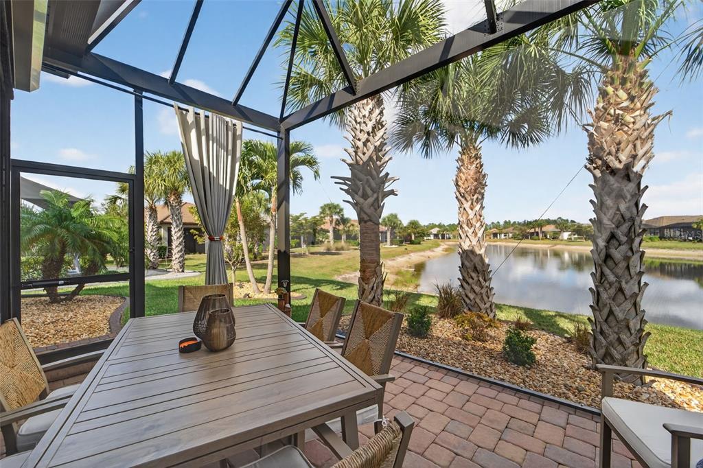 1721 Hyssop Loop North Port, FL 34289 - Photo 36 of 70 a view of a balcony with lake view and a potted plant