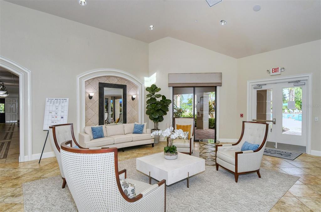1721 Hyssop Loop North Port, FL 34289 - Photo 51 of 70 a living room with furniture and a large window