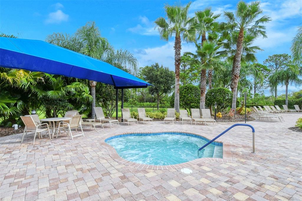 1721 Hyssop Loop North Port, FL 34289 - Photo 60 of 70 a view of a swimming pool with a patio