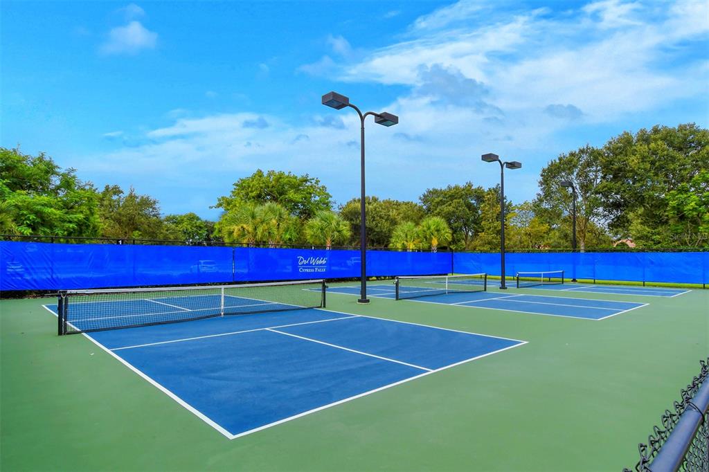 1721 Hyssop Loop North Port, FL 34289 - Photo 61 of 70 a view of an outdoor space and tennis court