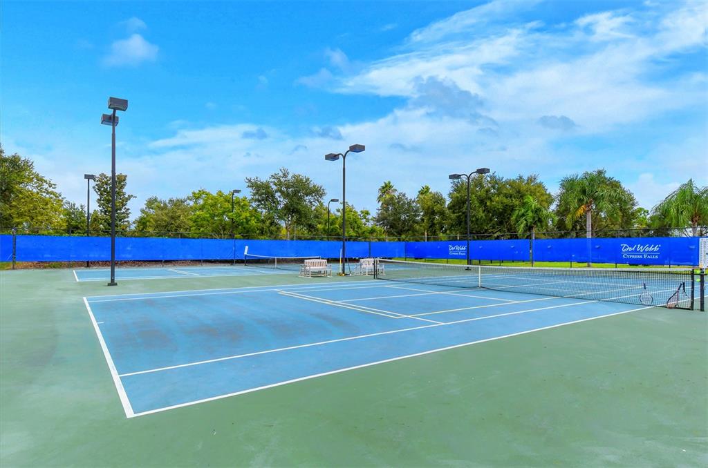 1721 Hyssop Loop North Port, FL 34289 - Photo 62 of 70 a view of an outdoor space and tennis court