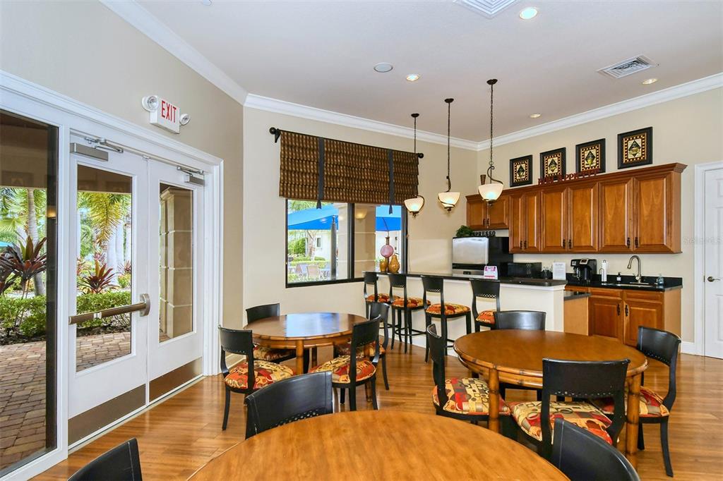 1721 Hyssop Loop North Port, FL 34289 - Photo 67 of 70 a living room with fireplace furniture and a large window