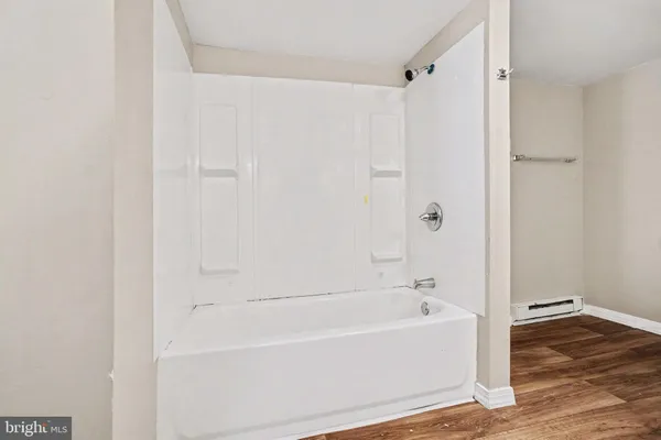 a bathroom with a bathtub