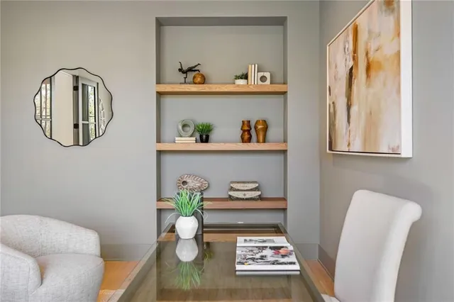 a view of dining room and cabinets