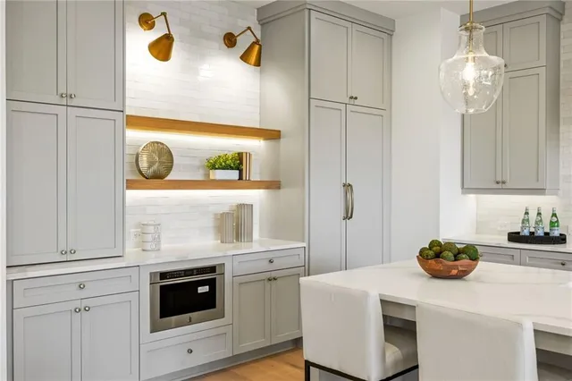 a kitchen with a sink and cabinets