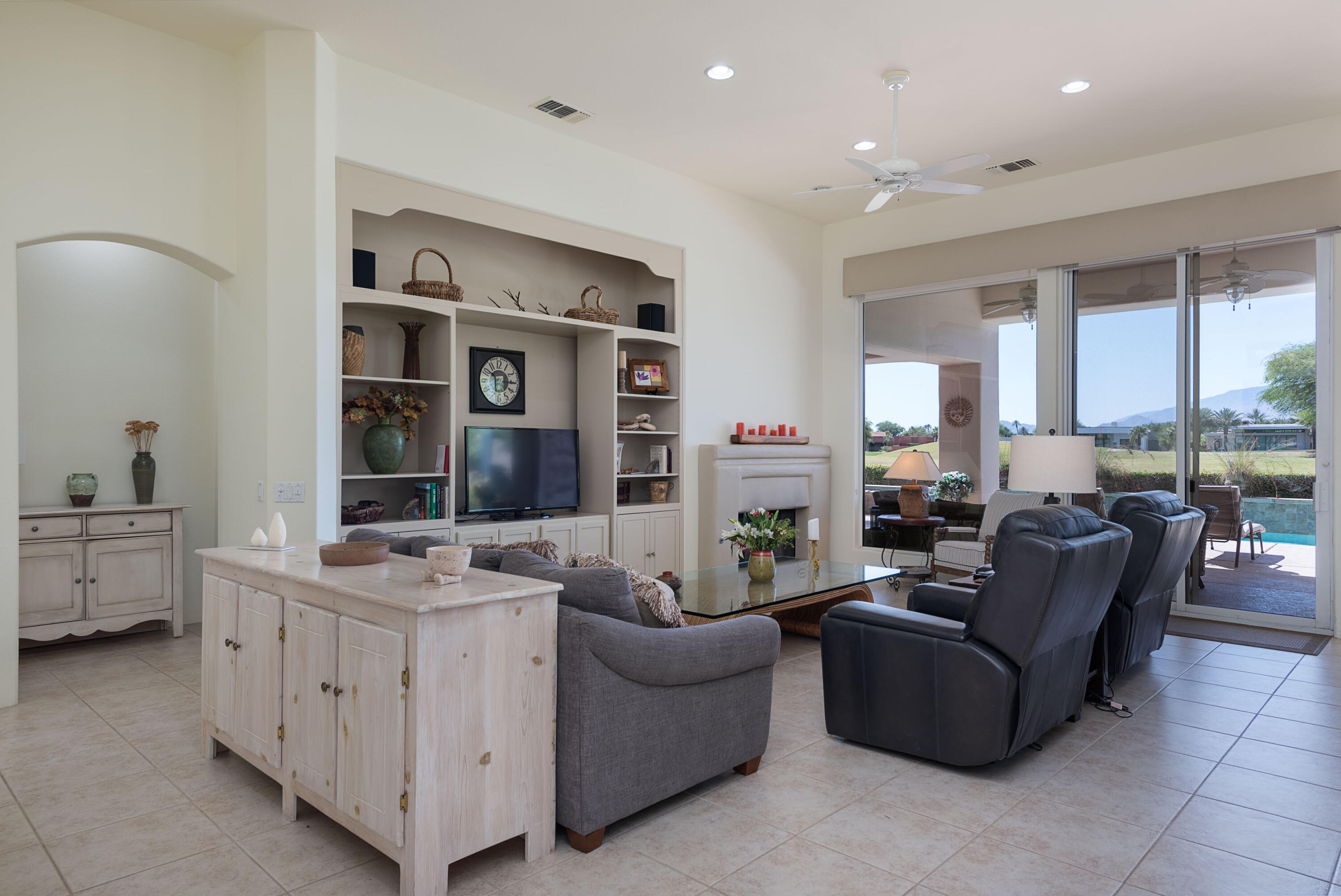 278 Loch Lomond Road Rancho Mirage, CA 92270 - Photo 16 of 49 a living room with furniture and a large window