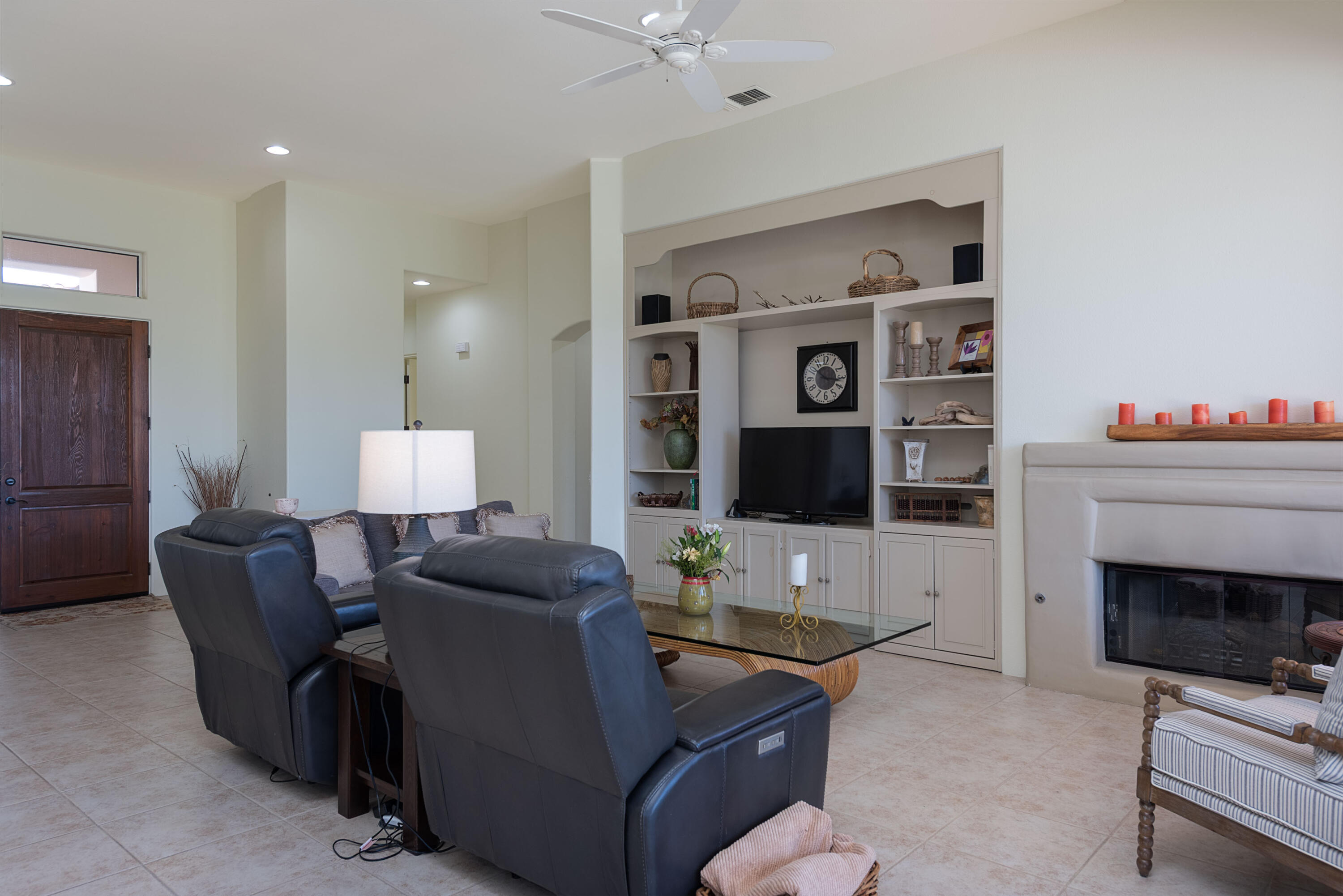 278 Loch Lomond Road Rancho Mirage, CA 92270 - Photo 18 of 49 a living room with furniture and a fireplace