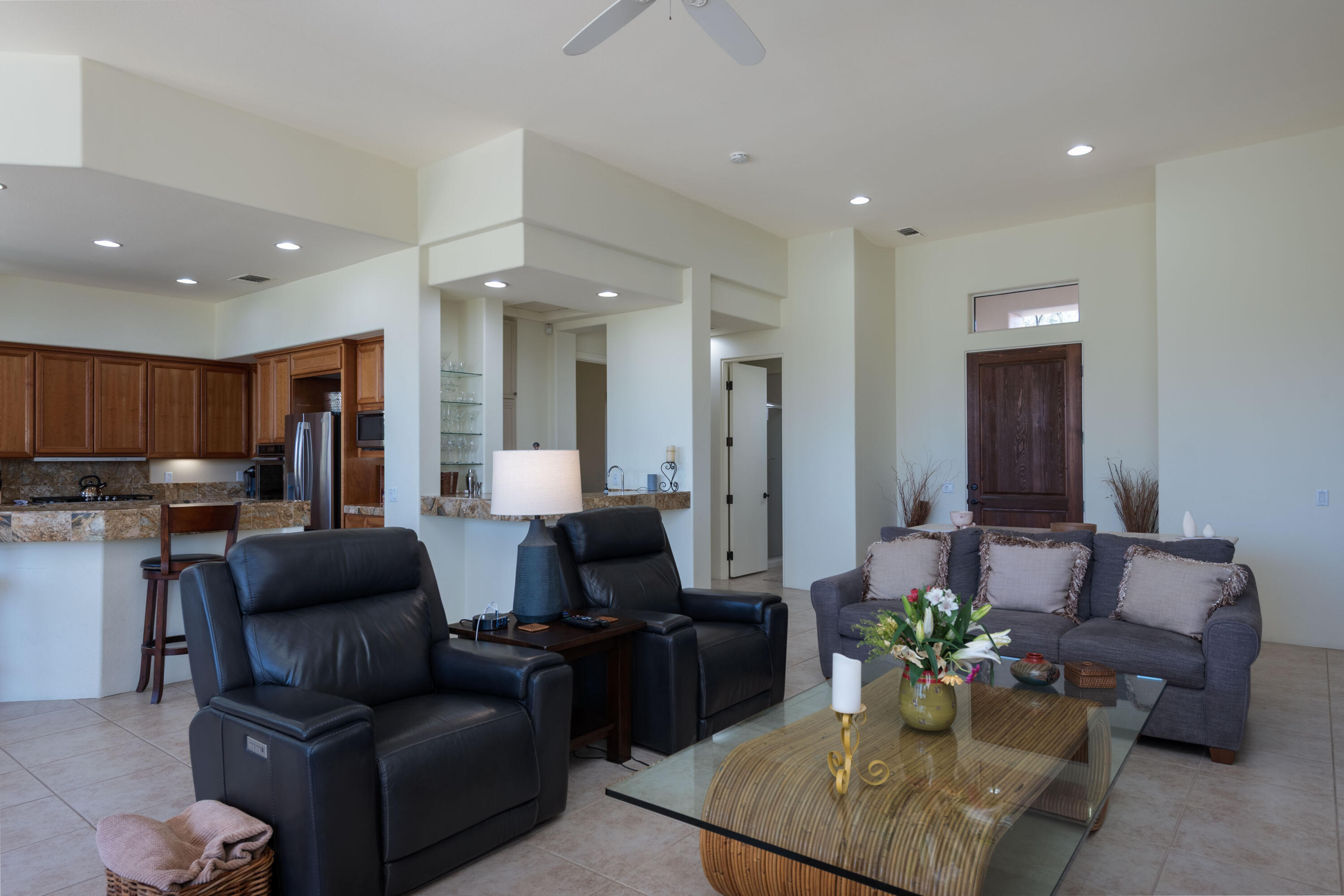 278 Loch Lomond Road Rancho Mirage, CA 92270 - Photo 19 of 49 a living room with furniture and a potted plant