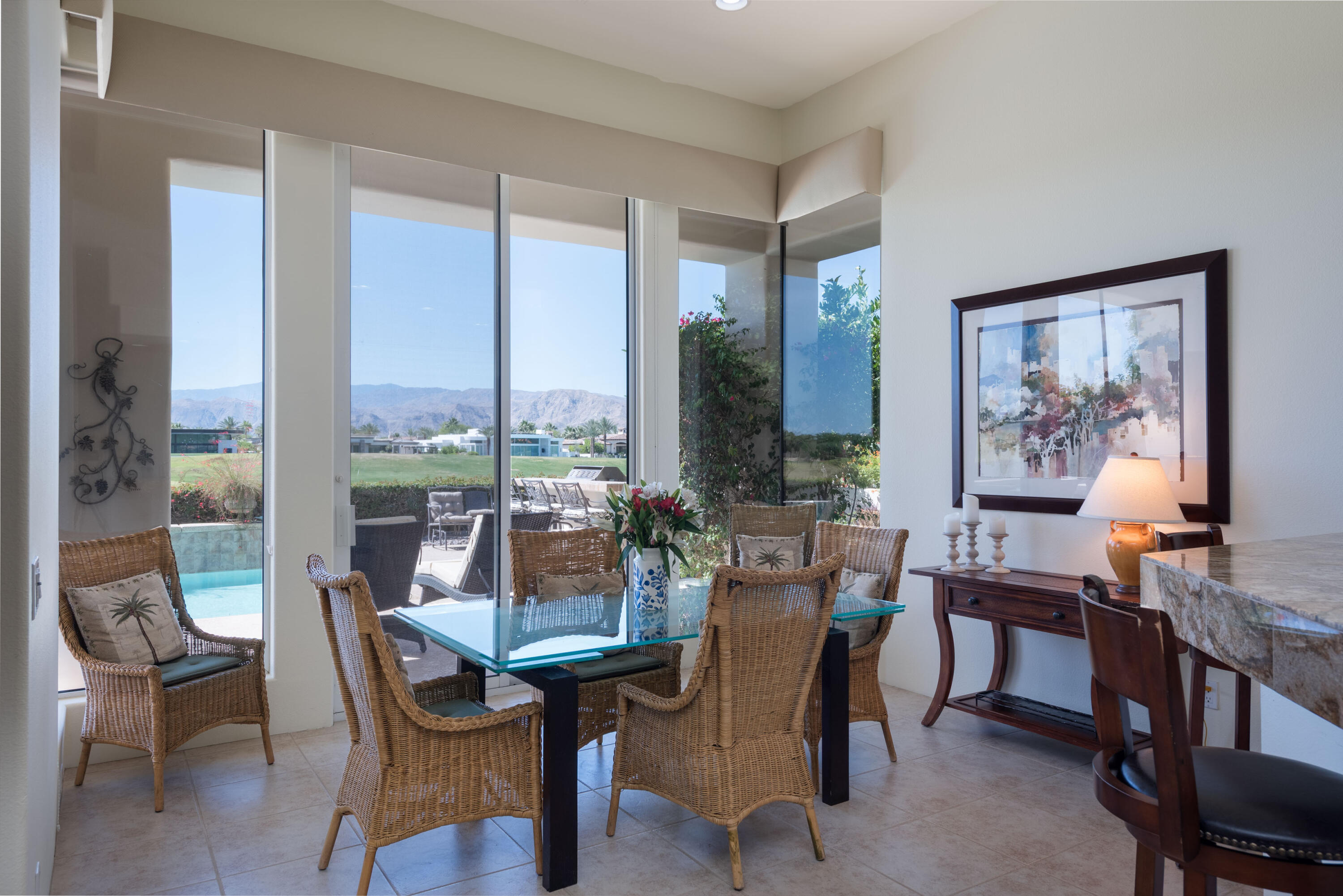 278 Loch Lomond Road Rancho Mirage, CA 92270 - Photo 20 of 49 a view of a dining room with furniture window and outside view