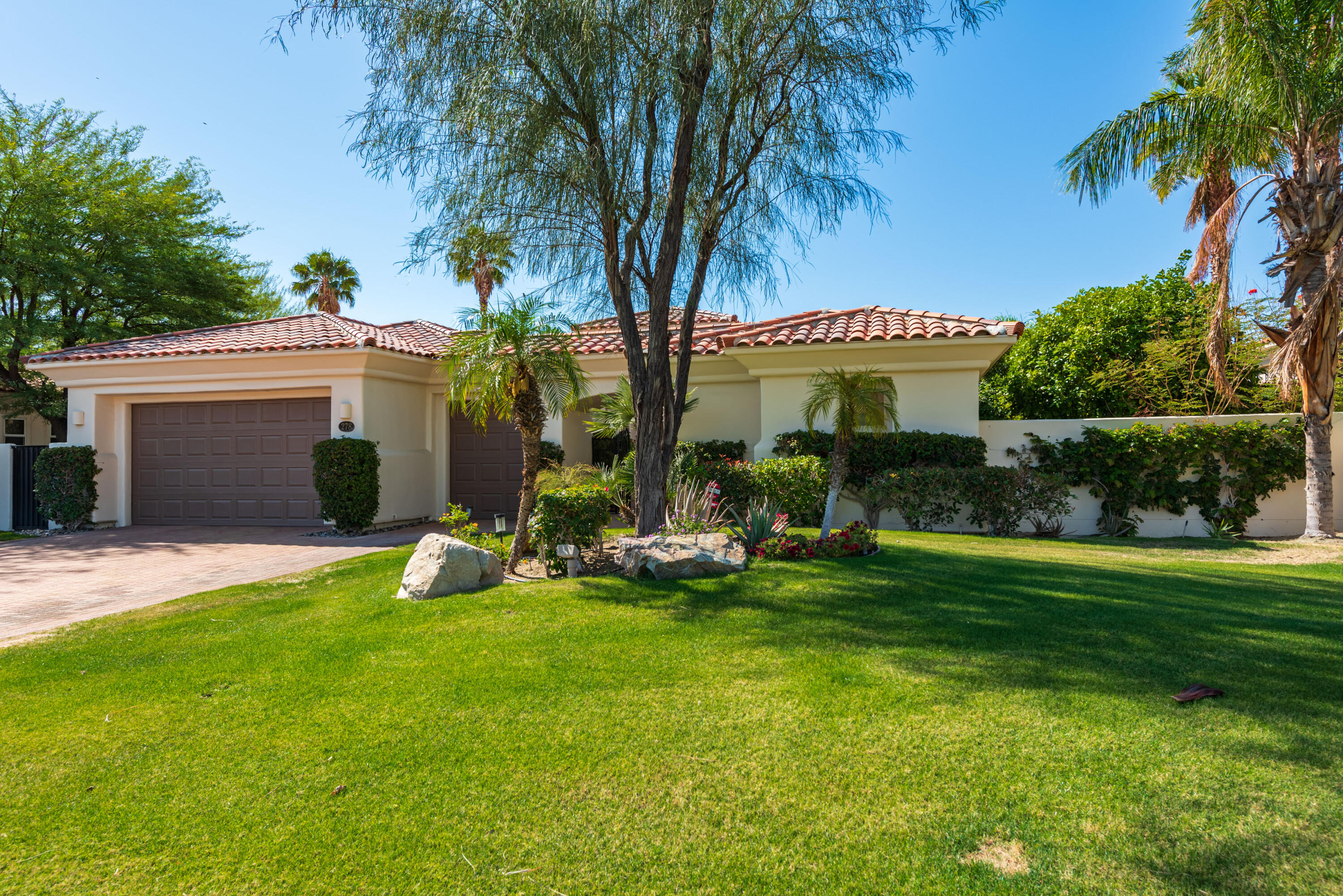 278 Loch Lomond Road Rancho Mirage, CA 92270 - Photo 3 of 49 a view of a house with a yard porch and sitting area