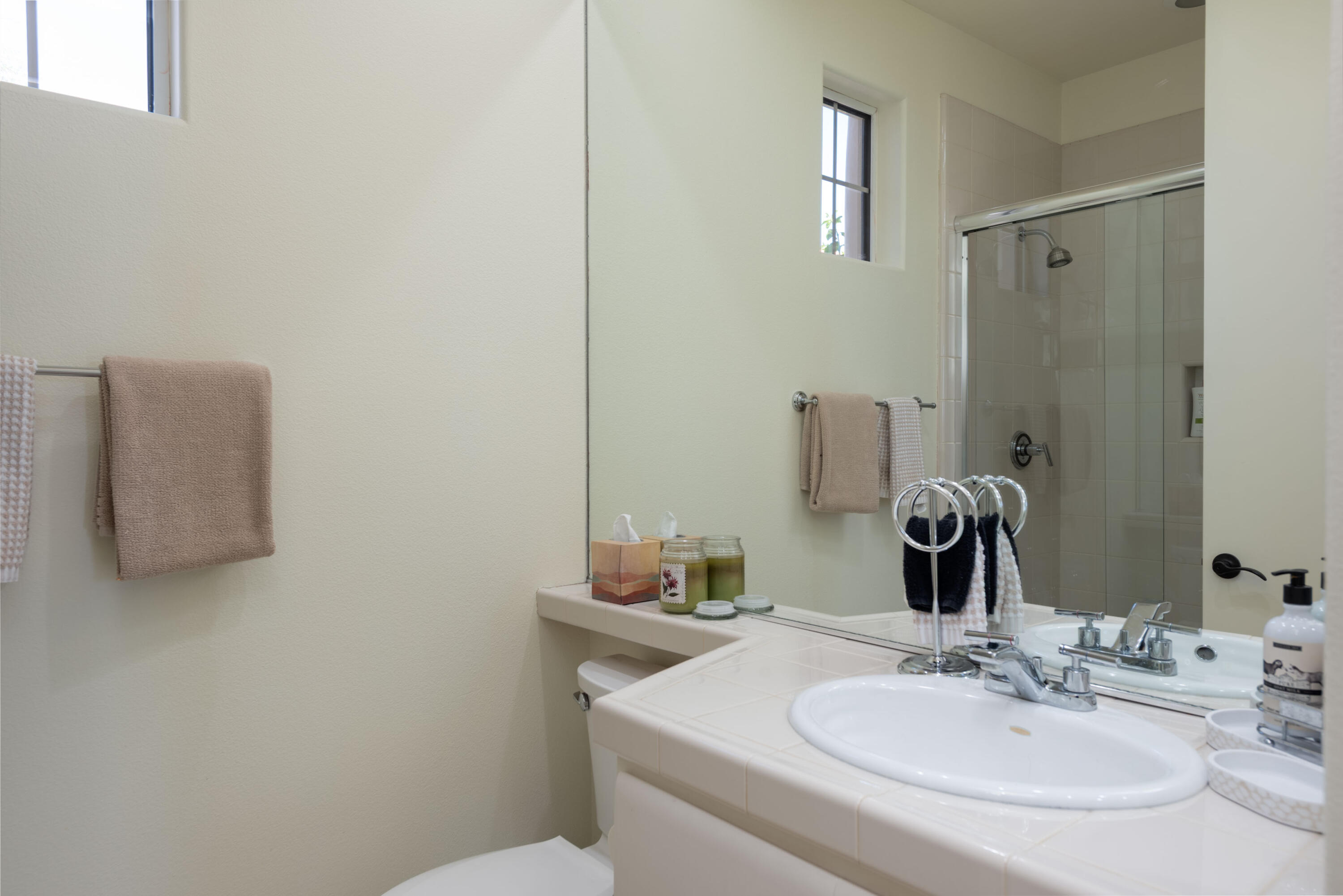 278 Loch Lomond Road Rancho Mirage, CA 92270 - Photo 38 of 49 a bathroom with a sink and a mirror