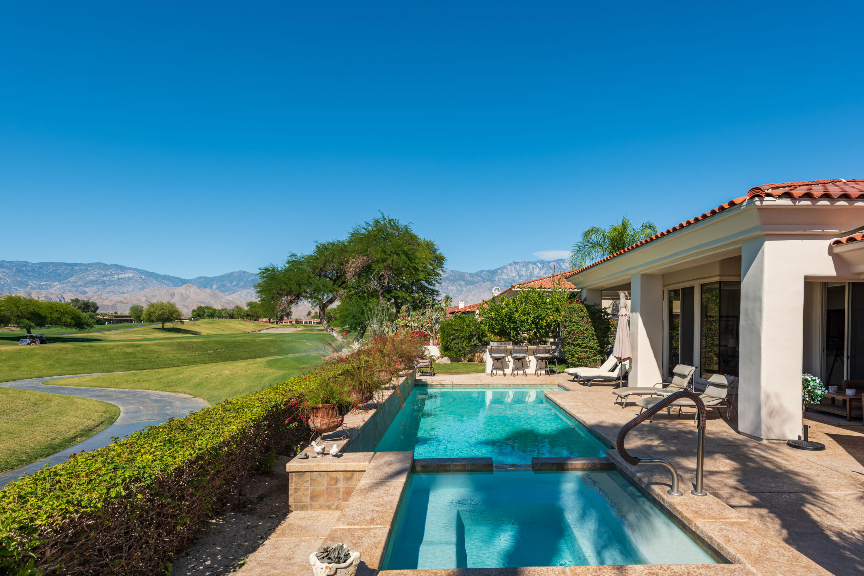 278 Loch Lomond Road Rancho Mirage, CA 92270 - Photo 42 of 49 a view of a backyard with sitting area